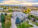 Luxury home with sunrise views and autumn foliage at 774 Chamberlain Way, Highlands Ranch, CO 80126