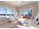 Well-lit bedroom with window seat and mountain views at 774 Chamberlain Way, Highlands Ranch, CO 80126