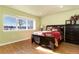 Basement bedroom with hardwood floors and large window at 774 Chamberlain Way, Highlands Ranch, CO 80126