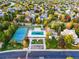 Aerial view of tennis courts, pool, and playground at 774 Chamberlain Way, Highlands Ranch, CO 80126