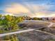 Scenic walking path with bridge and autumn foliage at 774 Chamberlain Way, Highlands Ranch, CO 80126