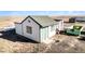 Detached workshop on property with propane tank at 43303 E 96Th Ave, Bennett, CO 80102