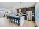 Modern kitchen with stainless steel appliances and large island at 1714 Peak Loop, Broomfield, CO 80023