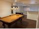 Basement featuring both a home theatre and pool table area, with wooden floors and neutral paint at 16119 E Prentice Ln, Centennial, CO 80015