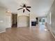 Bright living room featuring hardwood floors and fireplace at 2258 Whistler Dr, Longmont, CO 80504