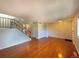 Bright living room with hardwood floors and staircase at 750 Tabor St # 18, Lakewood, CO 80401