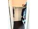Walk-in closet featuring shelving and a hanging rack, offering ample storage space at 14221 E 1St Dr # 208, Aurora, CO 80011