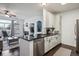Spacious kitchen featuring modern appliances and breakfast bar overlooking the living room at 14221 E 1St Dr # 208, Aurora, CO 80011