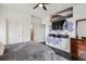Spacious bedroom featuring dark floors, neutral decor, and a functional layout at 14221 E 1St Dr # 208, Aurora, CO 80011