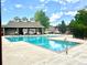 Well-maintained community pool with a pavilion, lounge seating, and a pergola at 14221 E 1St Dr # 208, Aurora, CO 80011