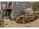 Backyard featuring hot tub, greenhouse and multi-tiered garden at 8626 Junco Trl, Evergreen, CO 80439