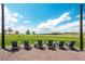 Relaxing community space with chairs, open green space and mountain views at 8548 S Quatar St, Aurora, CO 80016