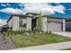 Charming single-Gathering home with stone accents, well-maintained lawn, and a two-car garage at 8548 S Quatar St, Aurora, CO 80016
