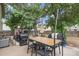 Backyard featuring a dining table with grill, plus a playhouse, offering options for outdoor enjoyment at 309 S 30Th Ave, Brighton, CO 80601
