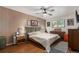 Well-decorated bedroom with wood floors, textured wall, modern furniture, and natural light at 309 S 30Th Ave, Brighton, CO 80601
