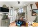 Sunlit room with a collection of toys near the window, providing a cheerful play area at 309 S 30Th Ave, Brighton, CO 80601