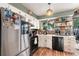 Bright and updated kitchen featuring modern stainless steel appliances and open shelving at 309 S 30Th Ave, Brighton, CO 80601