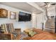 Cozy living room with tv, lots of seating and hardwood floors at 309 S 30Th Ave, Brighton, CO 80601