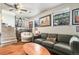 Inviting living room with natural light, wood floors, and staircase access at 309 S 30Th Ave, Brighton, CO 80601