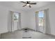Bright, open bedroom with neutral carpet features two windows and lots of natural light at 1455 Hudson St, Denver, CO 80220
