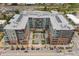 Overhead shot of the building complex featuring a central courtyard and nearby street parking at 20 Wilcox St # 318, Castle Rock, CO 80104