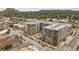 A scenic aerial view of the modern multi-story apartment buildings at 318 on the Plaza at 20 Wilcox St # 318, Castle Rock, CO 80104