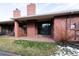 Backyard patio with red brick, an outdoor seating area, and access to the interior at 2800 S University Blvd # 184, Denver, CO 80210