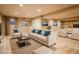 Staged living room featuring neutral furniture, a large rug, and an inviting atmosphere at 2800 S University Blvd # 184, Denver, CO 80210