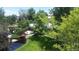 Aerial view of the community features a pond and walking paths at 1300 S Parker Rd Rd # 210, Denver, CO 80231