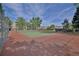 Community tennis court with surrounding fence at 1300 S Parker Rd Rd # 210, Denver, CO 80231