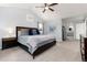 Main bedroom with ensuite bathroom and walk-in closet at 8177 Oak Briar Way, Castle Pines, CO 80108