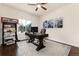 Bright home office with built-in shelving and large window at 8177 Oak Briar Way, Castle Pines, CO 80108