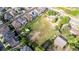 High angle aerial view showcasing the large lot, neighborhood proximity, and convenient access at 1245 S Willow St, Denver, CO 80247