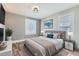 Comfortable bedroom featuring natural light, a decorative rug, and modern furnishings at 101 S 11Th Ave, Brighton, CO 80601