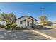 Charming single-story home with inviting front yard, covered porch, and well-maintained landscaping at 101 S 11Th Ave, Brighton, CO 80601