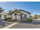 Charming single-story home with inviting front yard, covered porch, and well-maintained landscaping at 101 S 11Th Ave, Brighton, CO 80601