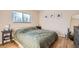 Spacious bedroom with a large bed and lots of natural light at 3830 N Adams St, Denver, CO 80205