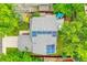 Aerial view showcasing the home's roof with solar panels, as well as the backyard at 2140 W 135Th Ave, Westminster, CO 80234