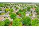 Neighborhood aerial view highlighting mature trees and the property's location at 2140 W 135Th Ave, Westminster, CO 80234