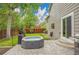 Backyard with a hot tub and patio, creating a relaxing outdoor space with a lush lawn at 2140 W 135Th Ave, Westminster, CO 80234