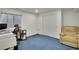 Spare bedroom with a window, closet, and a comfy armchair at 2140 W 135Th Ave, Westminster, CO 80234
