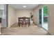 Dining area with wood floors and access to the patio through a sliding glass door at 2140 W 135Th Ave, Westminster, CO 80234