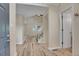 Inviting entryway features stylish wood flooring and a bright, open layout with staircase views at 2140 W 135Th Ave, Westminster, CO 80234