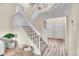 Staircase leading to upper level with neutral carpet and white railings at 2140 W 135Th Ave, Westminster, CO 80234