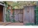 Secluded patio area featuring brick pavers and wooden fence at 1333 S Eudora St, Denver, CO 80222