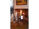 Cozy fireplace setting featuring a wine and glassware arrangement perfect for relaxation at 1333 S Eudora St, Denver, CO 80222