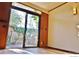 Indoor living space with a sliding glass door that leads to a fenced-in backyard at 1333 S Eudora St, Denver, CO 80222