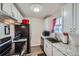 Well-equipped kitchen featuring granite countertops at 1289 S Gilbert St # A302, Castle Rock, CO 80104