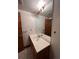Bathroom featuring vanity with sink, large mirror, and tile flooring at 15983 E Loyola Dr, Aurora, CO 80013