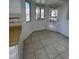 Cozy breakfast nook with a tiled floor, windows, and access to the backyard at 15983 E Loyola Dr, Aurora, CO 80013